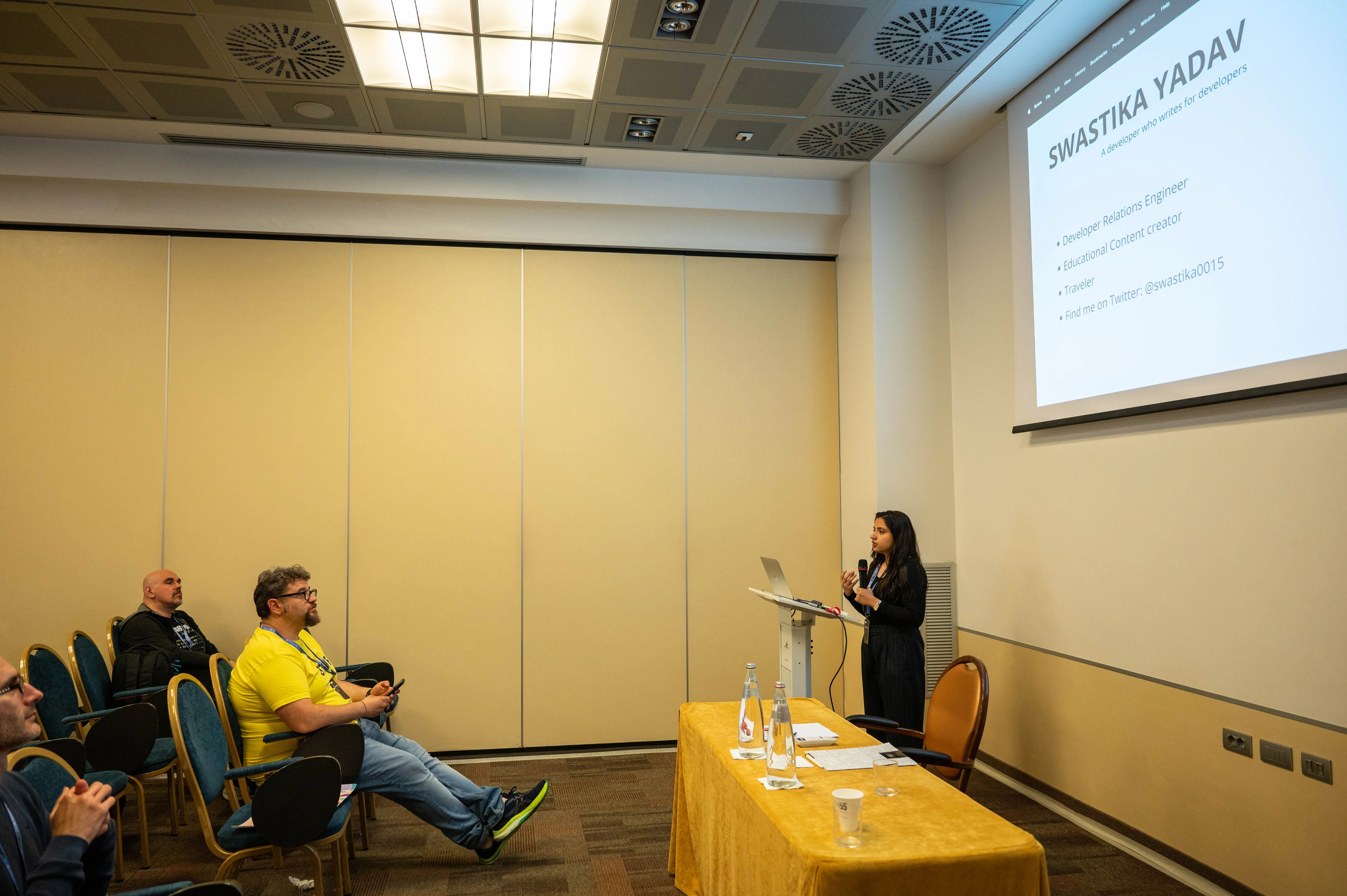 Audience watching Swastika speak at PyCon Italy
